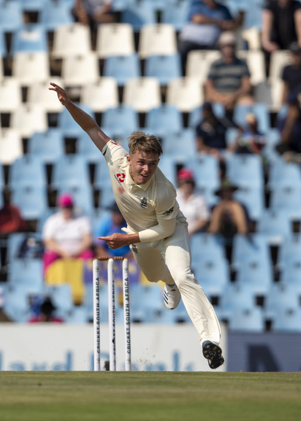 England's bowler Sam Curran watches his delivery on day one of the first cricket test match between South Africa and England at Centurion Park, Pretoria, South Africa, Thursday, Dec. 26, 2019. (AP Photo/Themba Hadebe)