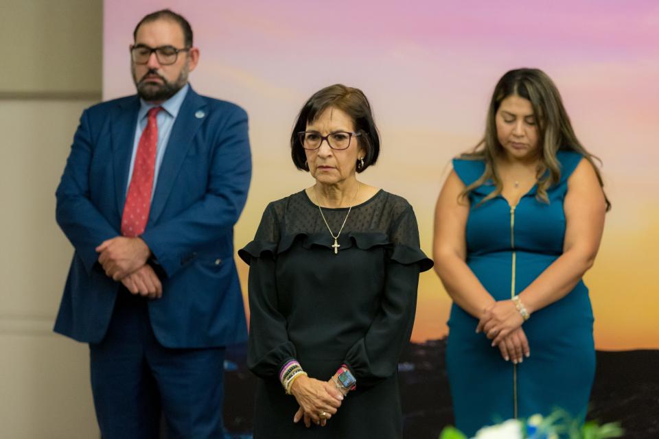 From left, El Paso District 1 city Rep. Peter Svarzbein, District 8 city Rep. Cissy Lizarraga, and District 3 city Rep. Cassandra Hernandez take a moment of silence at the Aug. 3 bell toll memorial at City Hall in El Paso on Aug. 2.