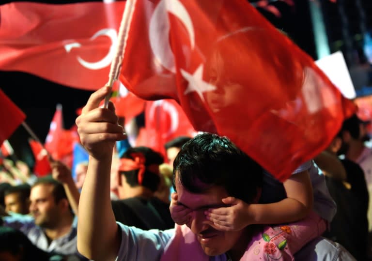 Erdogan supporters rally in Taksim square in Istanbul on July 21, 2016 following the failed July 15 coup attempt