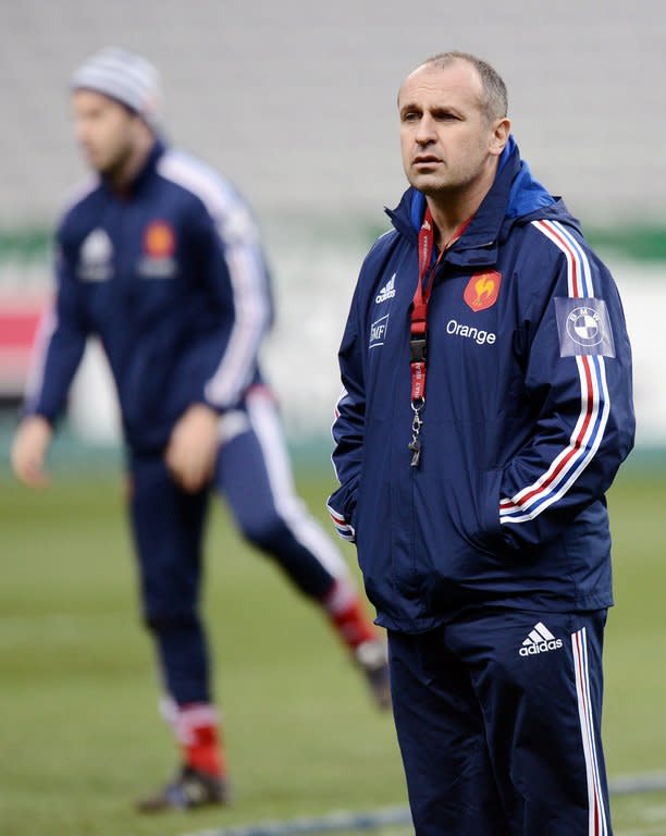 France rugby coach Philippe Saint Andre watches his side training, on February 8, 2013, at the Stade de France in Paris. Saint-Andre is looking for a much improved performance from his men in the clash with Wales