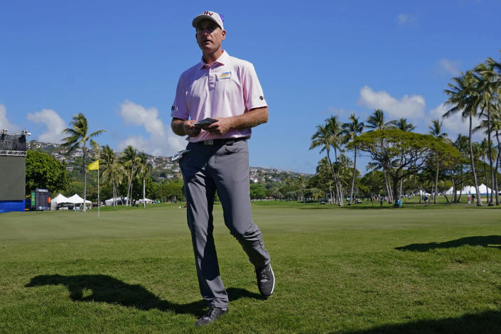 Jim Furyk walks off the course after the first round of the Sony Open golf tournament, Thursday, Jan. 13, 2022, at Waialae Country Club in Honolulu. (AP Photo/Matt York)