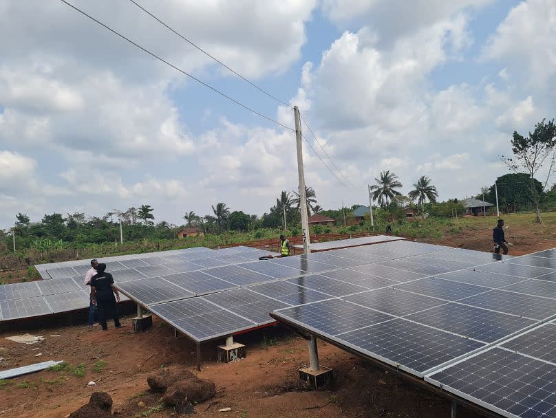 Solar panels are installed in a community in Nigeria.