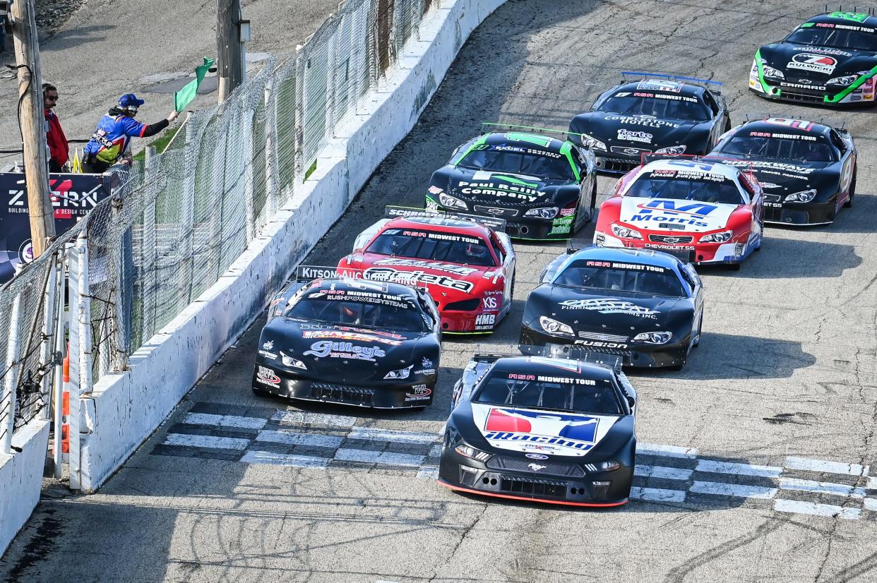 Ty Majeski (91) leads Max Kahler (17) and the rest of the field on a restart in the Jerry "Bear" Priesgen Memorial Sunday, April 21, 2024, at the Slinger Speedway in Slinger, Wisconsin.