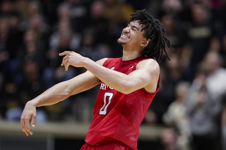 Rutgers guard Geo Baker (0) celebrates in the closing seconds of overtime in an NCAA college basketball game against Purdue in West Lafayette, Ind., Saturday, March 7, 2020. Rutgers defeated Purdue 71-68 in overtime. (AP Photo/Michael Conroy)