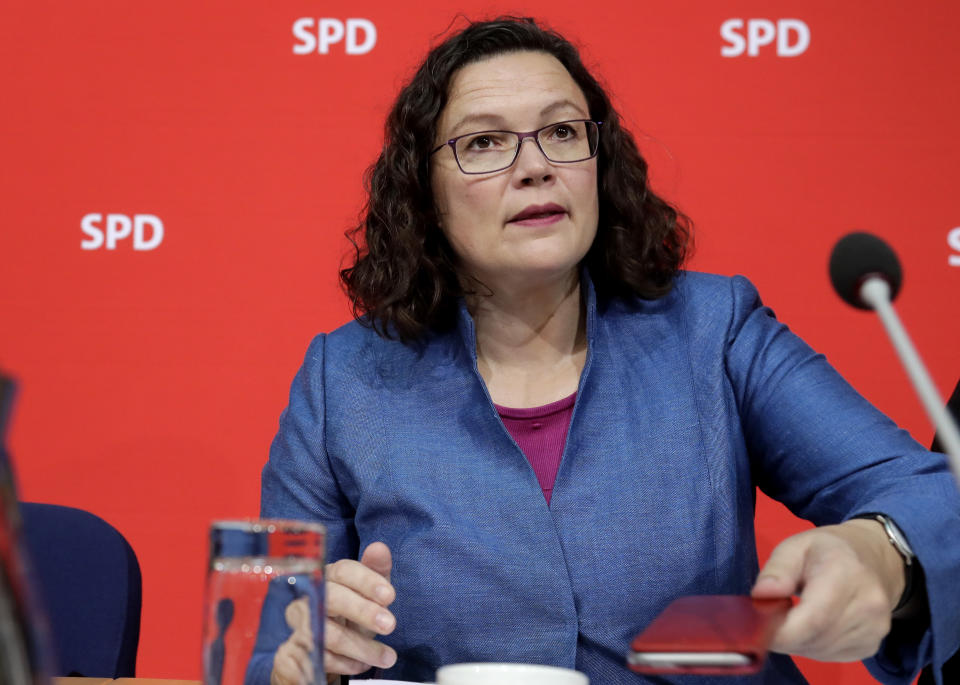 Andrea Nahles, left, chairwomen of the German Social Democratic Party, attends a party's board meeting in Berlin, Germany, Monday, Oct. 15, 2018 the day after the state elections in the German state of Bavaria. (AP Photo/Michael Sohn)