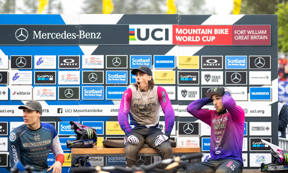 Downhill mountain bikers on the podium at Fort William