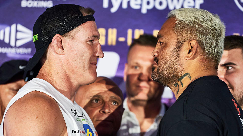 Paul Gallen and Mark Hunt are seen here staring one another down at weigh-in.