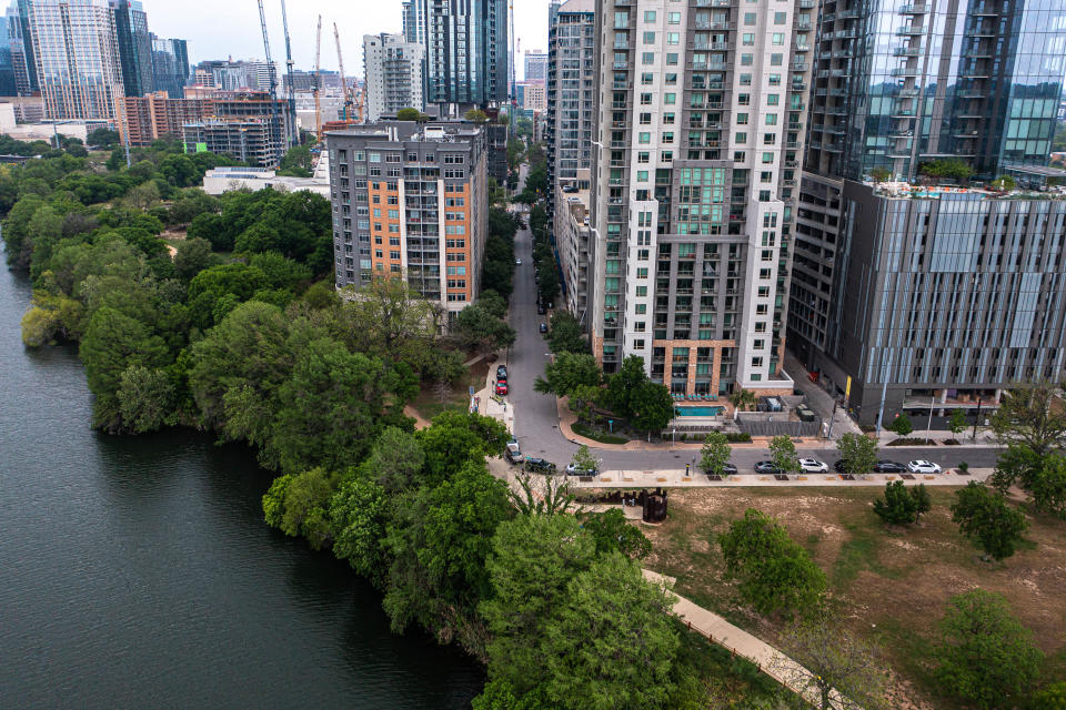 The shore of Lady Bird Lake is less than one hundred feet from the end of Rainey Street on Sunday April 2, 2023 in Downtown Austin. Two bodies have been recovered along the shore near Rainey Street and East Avenue in the past six weeks.