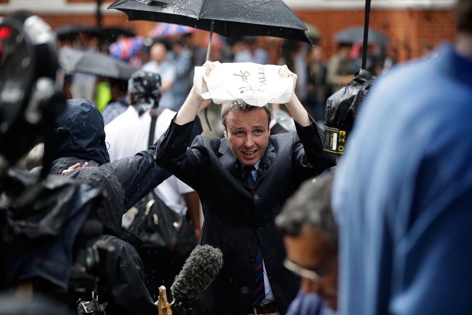 LONDON, ENGLAND - AUGUST 16: Press and media gather in the rain outside the Ecuadorian Embassy, where Julian Assange, founder of Wikileaks is staying on August 16, 2012 in London, England. Mr Assange has been living inside Ecuador's London embassy since June 19, 2012 after requesting political asylum whilst facing extradition to Sweden to face allegations of sexual assault. His request was granted by Ecuador this afternoon. (Photo by Matthew Lloyd/Getty Images)