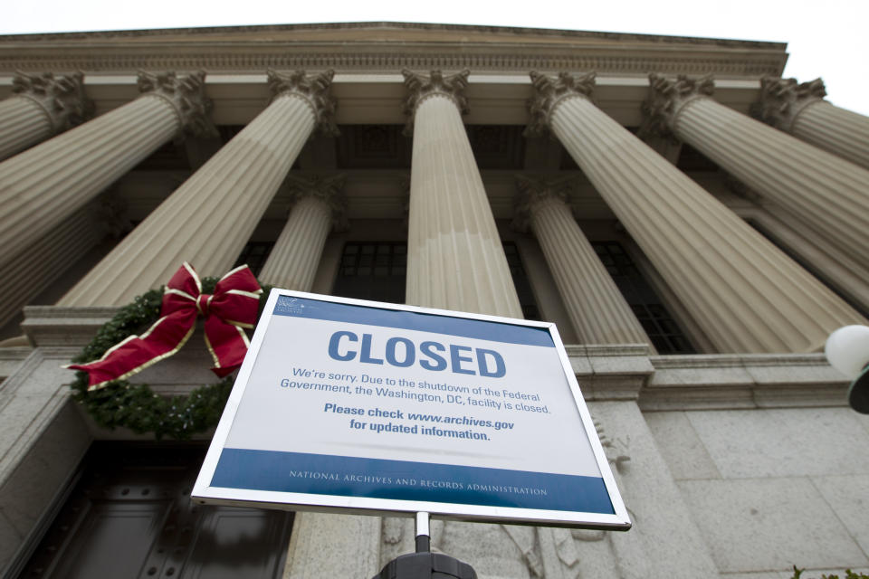 A closed sign is displayed at The National Archives entrance in Washington, Jan. 1, 2019, as a partial government shutdown stretches into its third week. A high-stakes move to reopen the government will be the first big battle between Nancy Pelosi and President Donald Trump as Democrats come into control of the House. (Photo: Jose Luis Magana/AP)