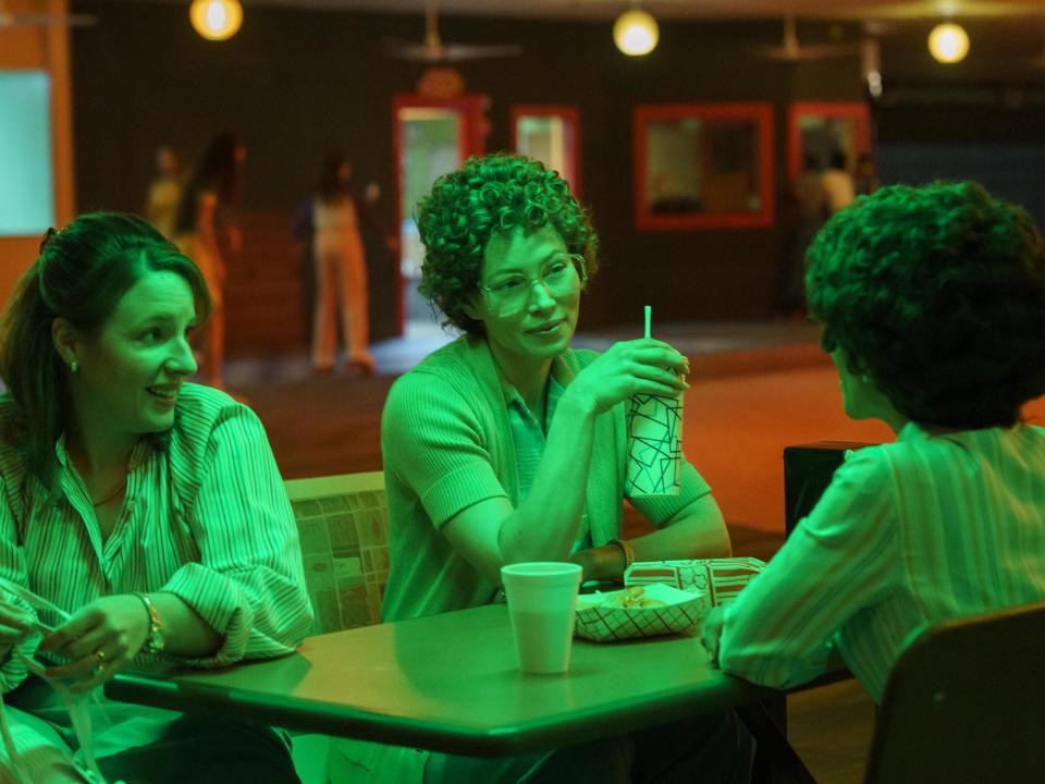 Candy (Jessica Biel) chats with her friend Sherry (Jessie Mueller) and pastor Jackie (Selena Anduze) on Hulu's "Candy."