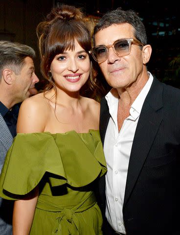 <p>Matt Winkelmeyer/Getty</p> Dakota Johnson and Antonio Banderas on Sept. 7, 2019