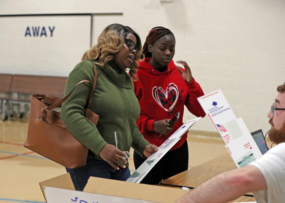 Natiaya Thurmond and her 18-year-old daughter Xiomara, a first-time voter, cast their ballots in the 16th precinct at the Roseville Recreation Center on Tuesday, November 8, 2022.