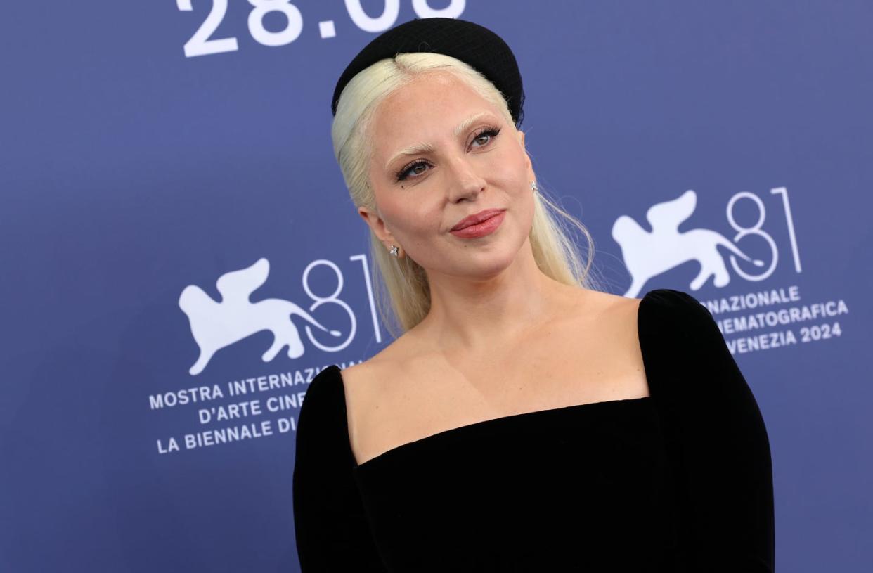 lady gaga smiles at the 2024 venice film festival