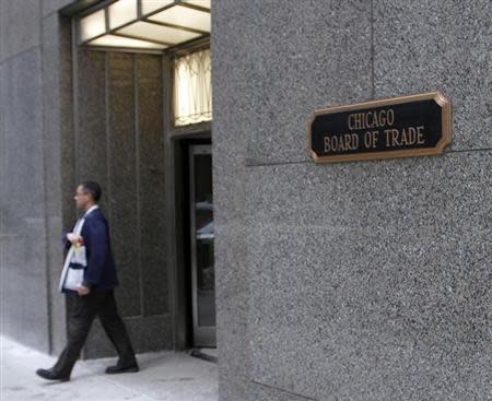 A trader walks out of the CME group at the Chicago Board of Trade in Chicago, February 11, 2011. REUTERS/Frank Polich