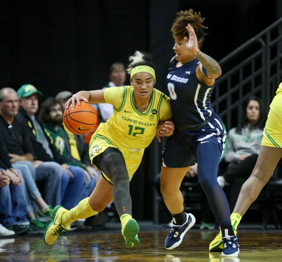 Oregon guard Te-Hina Paopao drives toward the basket as the Oregon Ducks host San Diego in a WNIT matchup Thursday, March 23, 2022, at Matthew Knight Arena in Eugene, Ore.