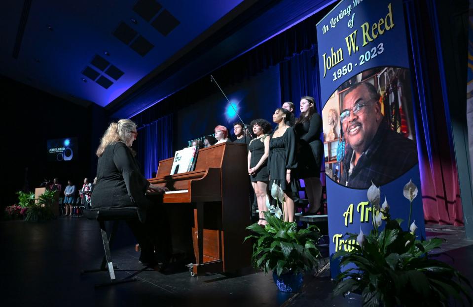Students from the Barnstable High School music department sang "Lift Every Voice and Sing" on Saturday at the school during a celebration of the life of Cape Cod human rights leader John Reed. Reed died Feb. 10.
