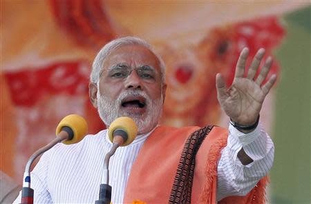 Hindu nationalist Narendra Modi, prime ministerial candidate for India's main opposition Bharatiya Janata Party (BJP), addresses a rally in the northern Indian city of Agra November 21, 2013. REUTERS/Anindito Mukherjee