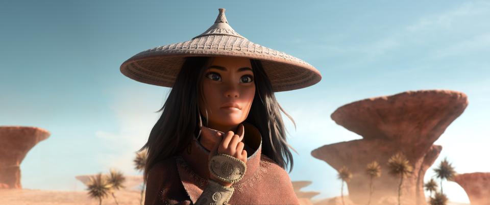 The lone warrior Raya (voiced by Kelly Marie Tran) ventures to find the legendary last dragon and stop the villainous Druun in "Raya and the Last Dragon."