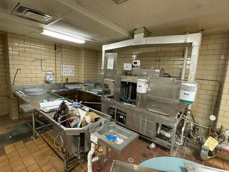 A dishwashing line with dish racks and hand sink is among the items being auctioned from the closed ProMedica Bixby Hospital in Adrian.