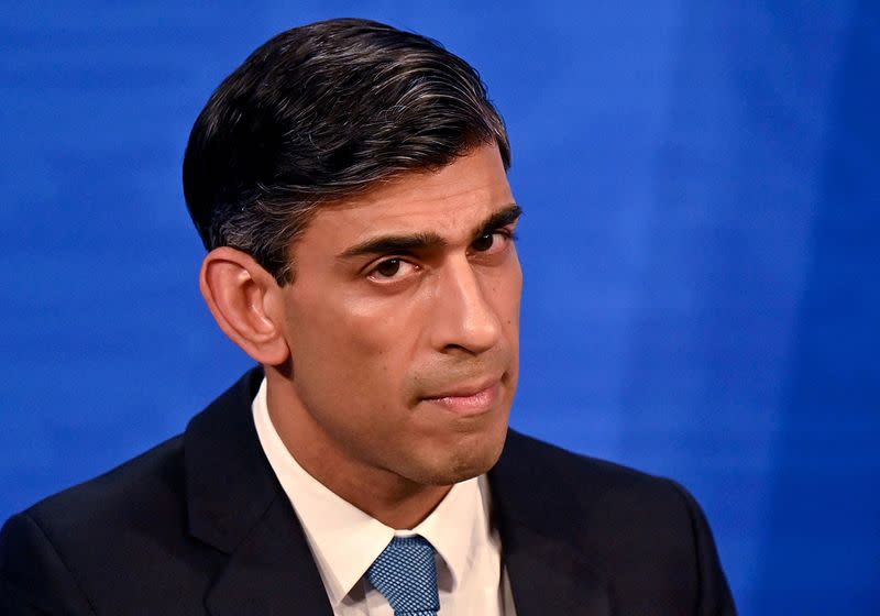FILE PHOTO: Britain's Chancellor of the Exchequer Rishi Sunak hosts a news conference in the Downing Street Briefing Room in London