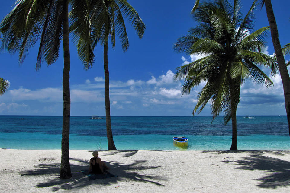 <p>No kids? No distractions. Head to the island nation’s bewitching beaches – it has too many to chose from – and kick back on creamy sands while cerulean waters lap your toes. <br><i>Image credit: <a href="https://www.flickr.com/photos/sabsub/" rel="nofollow noopener" target="_blank" data-ylk="slk:Just One Way Ticket;elm:context_link;itc:0;sec:content-canvas" class="link ">Just One Way Ticket</a></i></p>