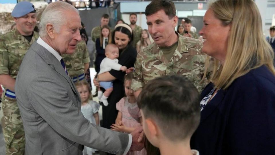 King Charles meeting staff member and their families at the Army Aviation Centre in Hampshire