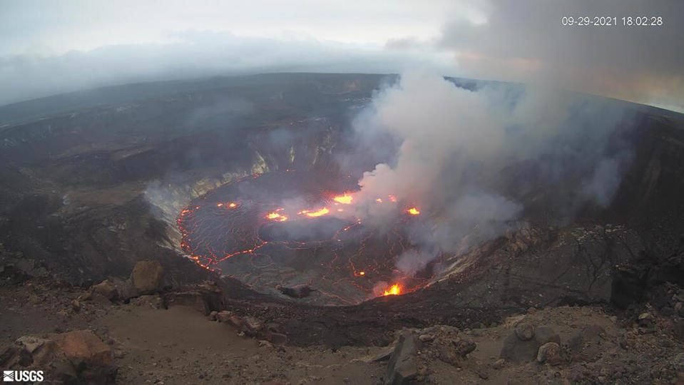 This webcam image provided by the United States Geological Survey shows a view of an eruption that has begun in the Halemaumau crater at the summit of Hawaii’s Kilauea volcano, Wednesday, Sept. 29, 2021. (USGS via AP)