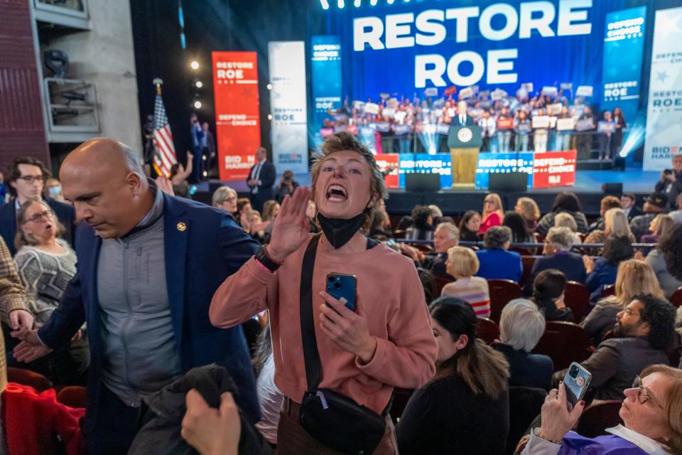 A protester who interrupted President Joe Biden is removed at an event on the campus of George Mason University in Manassas, Va., Tuesday, Jan. 23, 2024, to campaign for abortion rights, a top issue for Democrats in the upcoming presidential election.