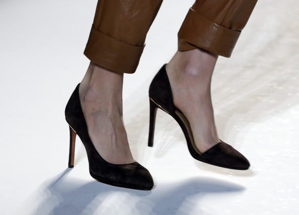 FILE - This Feb. 13, 2013 file photo shows a model wearing pointy shoes as the Rachel Zoe Fall 2013 collection is modeled during Fashion Week in New York. Sleek, sophisticated and ladylike, the pointy-toe shoe is coming back strong, pushing several seasons’ worth of chunky platforms toward the back of the closet. (AP Photo/Richard Drew, file)