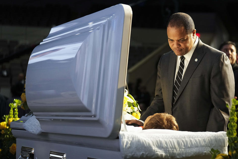Dallas Mayor Eric Johnson pays his respects at the casket of former U.S. Rep. Eddie Bernice Johnson before a funeral service at Concord Church on Tuesday, Jan. 9, 2024, in Dallas. (Smiley N. Pool/The Dallas Morning News via AP, Pool)