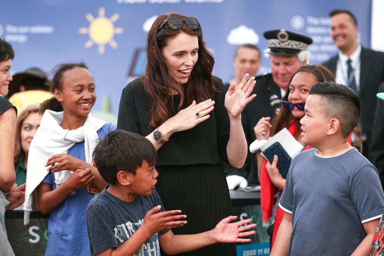 New Zealand Prime Minister Jacinda Ardern plays a game with children during celebrations in Ratana, New Zealand, in November 2018. Ardern's new "well-being budget" has children's well-being as one of its priorities. Credit: Hagen Hopkins/Getty Images (Photo: )