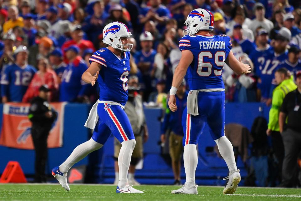 ORCHARD PARK, NEW YORK - OCTOBER 26: Sam Martin #8 and Reid Ferguson #69 of the Buffalo Bills reacts after a punt during the third quarter of the game against the Tampa Bay Buccaneers at Highmark Stadium on October 26, 2023 in Orchard Park, New York. (Photo by Rich Barnes/Getty Images)