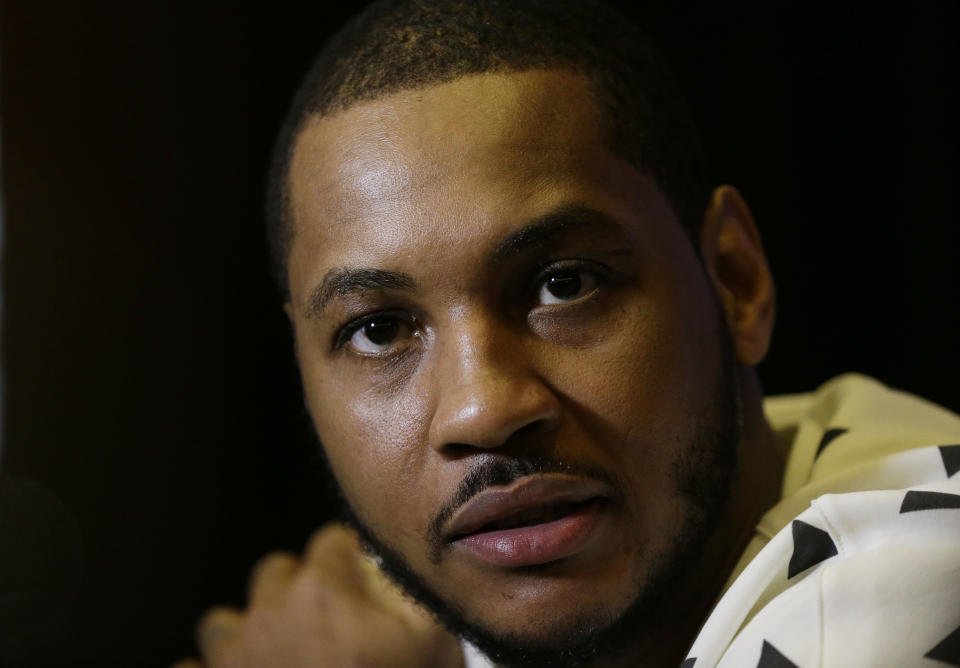 New York Knicks player Carmelo Anthony speaks during the NBA All Star basketball news conference, Friday, Feb. 14, 2014, in New Orleans. The 63rd annual NBA All Star game will be played Sunday in New Orleans. (AP Photo/Gerald Herbert)