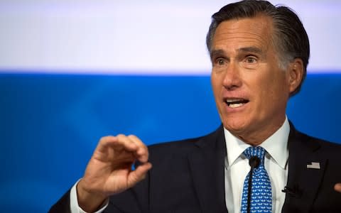 Republican senator Mitt Romney has been a vocal critic of the president - Credit: James M. Dobson&nbsp;/AP