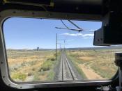 This Aug. 20, 2019, image shows the train tracks that serve as an artery between a coal mine near Kayenta, Ariz. and the coal-fired Navajo Generating Station near Page. The power plant will close before the year ends. (AP Photo/Susan Montoya Bryan)