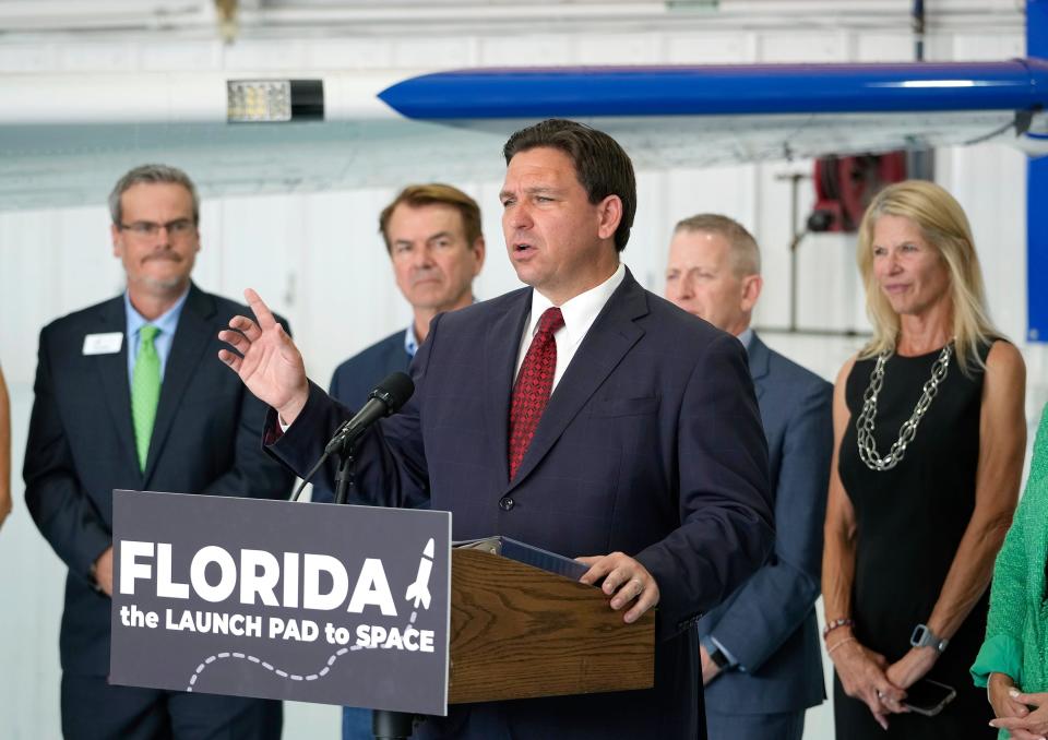 Gov. Ron DeSantis holds a news conference at Embry-Riddle Aeronautical University in Daytona Beach to announce new state job-training initiatives. Those behind him include Florida Rep. Thad Altman of Indialantic, just to the governor's left, and to the governor's right, Florida House Speaker-designate Paul Renner of Palm Coast and Florida Senate Majority Leader Debbie Mayfield of Indialantic.