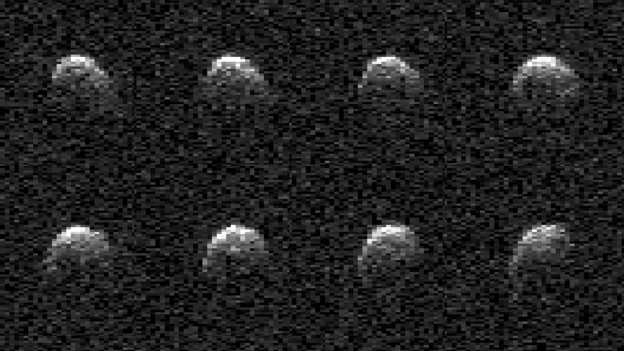  Eight grainy images of an oblong rock tumbling in space. 