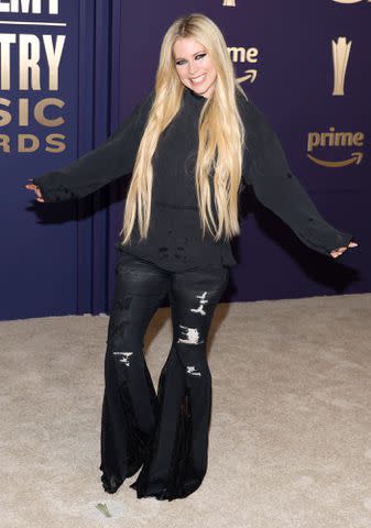 <p>Jason Kempin/Getty</p> Avril Lavigne at the ACM Awards in Frisco, Texas on May 16, 2024