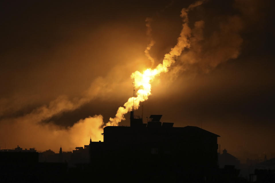 Israeli forces' flares light up the night sky in northern Gaza Strip, Tuesday, Oct. 31, 2023. (AP Photo/Abed Khaled)