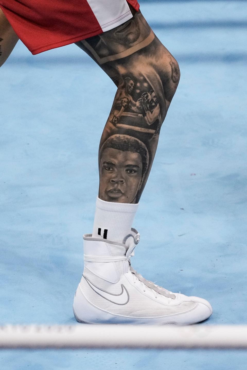 Boxer Harry Garside (AUS) displays a tattoo of Muhammad Ali on his leg during the Tokyo 2020 Olympic Summer Games at Kokugikan Arena on July 31, 2021. 