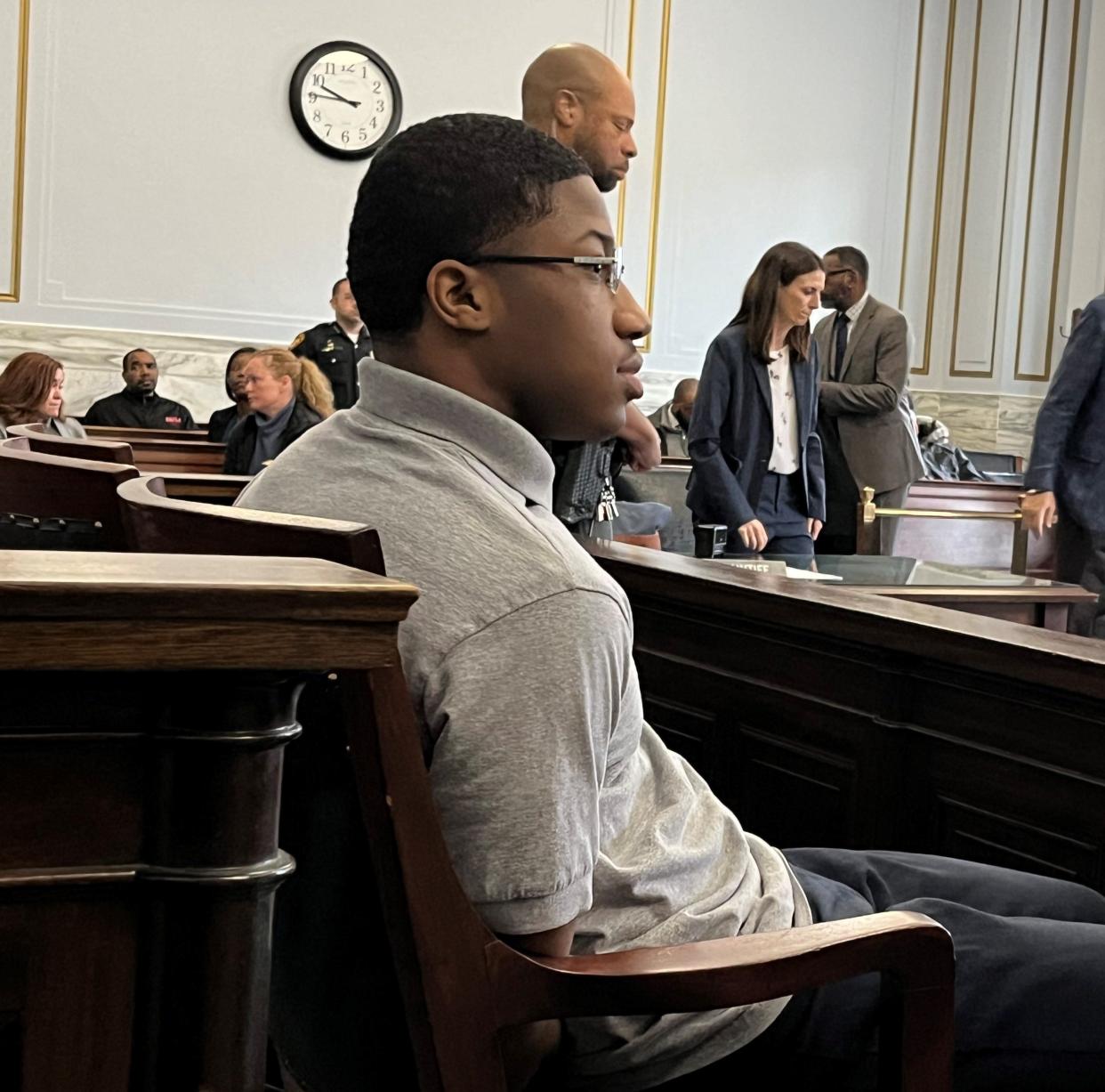Mikeem Thomas sits in the jury box in Hamilton County Common Pleas Judge Robert Goering's courtroom, waiting for his hearing to begin Friday.