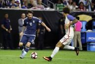 Jun 21, 2016; Houston, TX, USA; Argentina midfielder Lionel Messi (10) dribbles the ball against United States defender Fabian Johnson (23) during the second half in the semifinals of the 2016 Copa America Centenario soccer tournament at NRG Stadium. Kevin Jairaj-USA TODAY Sports