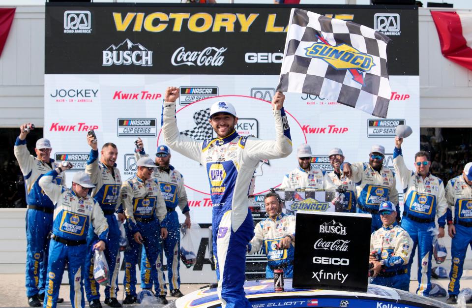 Chase Elliott, center, celebrates with his Hendrick Motorsports crew after winning the Jockey Made in America 250 Presented by Kwik Trip, Sunday at Road America.