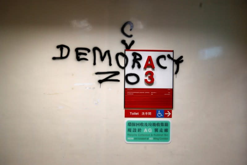 Graffiti is seen on a wall at the Hong Kong Polytechnic University (PolyU) in Hong Kong, China