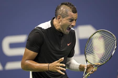 Nick Kyrgios of Australia yells during his first round match against Andy Murray of Britain at the U.S. Open Championships tennis tournament in New York, August 31, 2015. REUTERS/Carlo Allegri