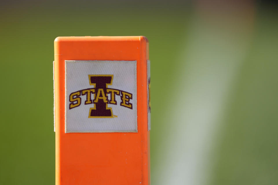 An Iowa State end zone pylon is seen on the field before an NCAA college football game against West Virginia, Saturday, Nov. 5, 2022, in Ames, Iowa. College athletic programs of all sizes are reacting to inflation the same way as everyone else. They're looking for ways to save. Travel and food are the primary areas with increased costs. (AP Photo/Charlie Neibergall)