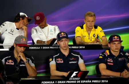 Formula One - Spanish Grand Prix - Barcelona-Catalunya racetrack, Montmelo, Spain - 12/5/16 McLaren's Fernando Alonso, Mercedes's Lewis Hamilton and Renault's Kevin Magnussen, Red Bull's Max Verstappen, Toro Rosso's Daniil Kvyat and Carlos Sainz attend a news conference ahead of the Spanish Grand Prix. REUTERS/Albert Gea