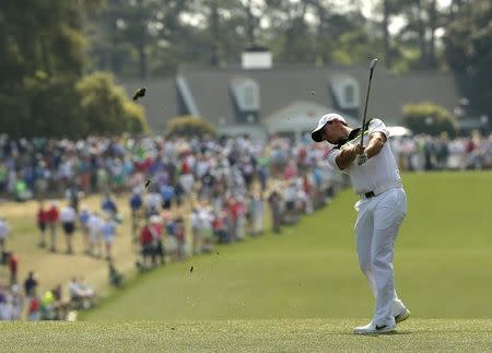 Rory McIlroy of Northern Ireland hits on the first fairway during first round play of the Masters golf tournament at the Augusta National Golf Course in Augusta, Georgia April 9, 2015. REUTERS/Brian Snyder