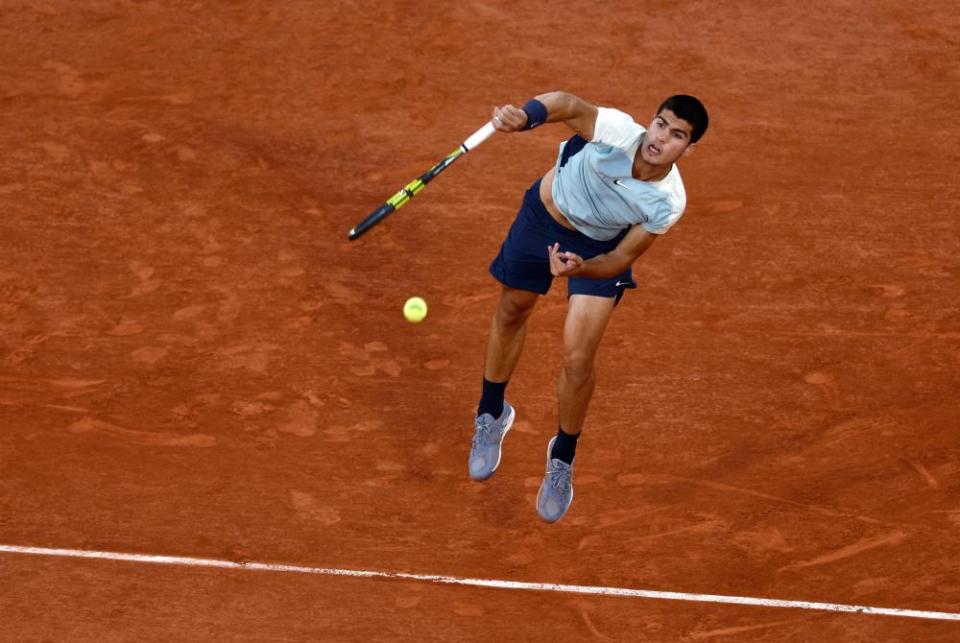 Carlos Alcaraz serves to Sebastian Korda in their third-round match